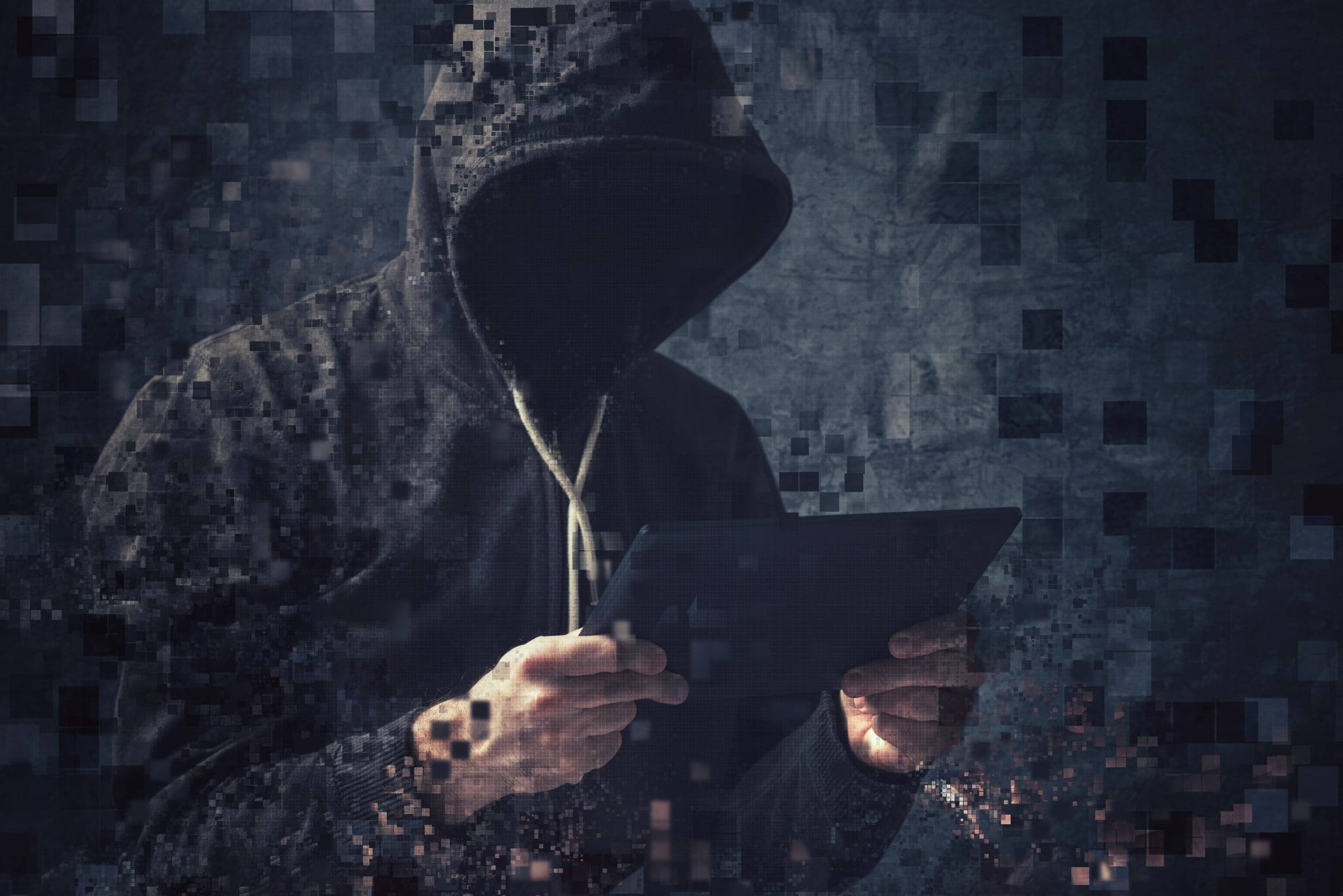 Pixelated unrecognizable hooded cyber criminal Avoid Chargeback Hell